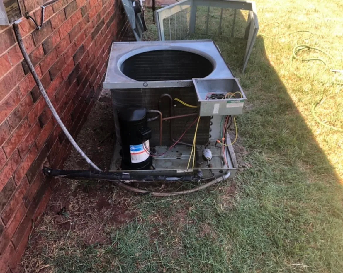AC condenser unit serviced by Full Send Plumbing Heating Cooling